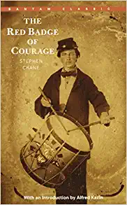 Vintage book cover of "The Red Badge of Courage" by Stephen Crane, depicting a soldier in battle, highlighting themes of war and heroism.