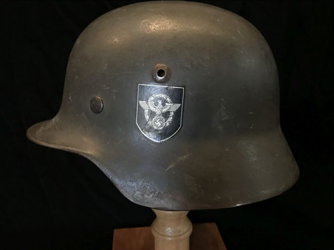 Front view of the WWII German Field Police helmet with double decals, certified by the Gettysburg Museum of History