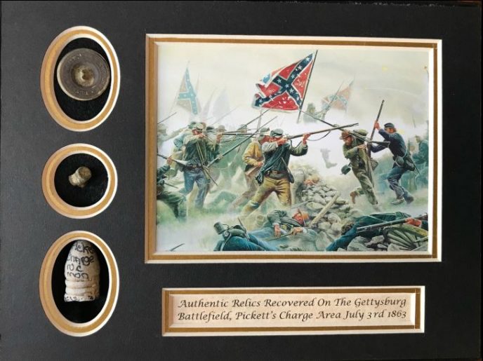 Relics collected from Pickett’s Charge area of the Gettysburg battlefield, shown in a glass display case