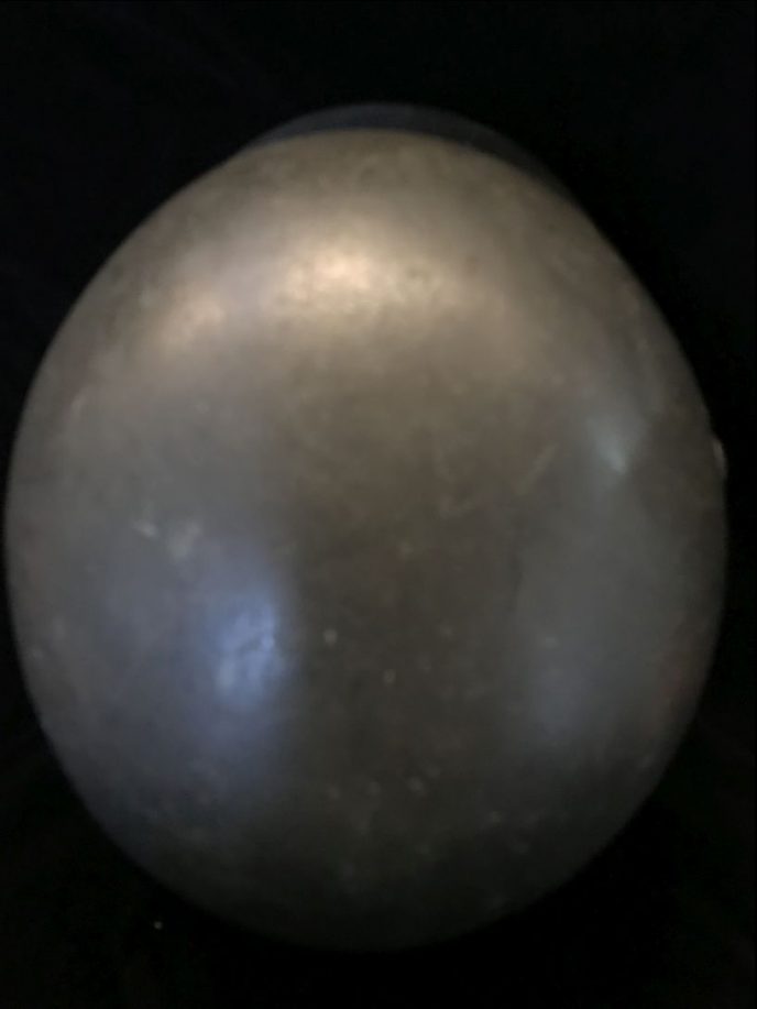 Close-up of WWII German M-35 Field Police helmet, brought back by a U.S. veteran, shown from the front