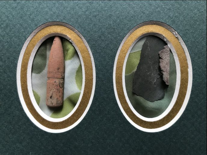 Band of Brothers World War II relics displayed in a glass case at the Gettysburg Museum of History