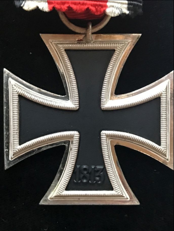 Close-up of WWII German Iron Cross Second Class medal with ribbon, brought home by U.S. veteran