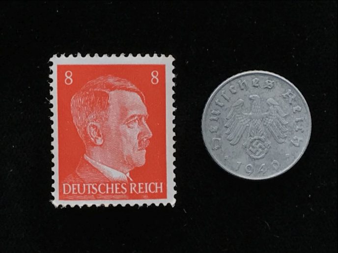 WWII-era German Nazi coin and stamp, displayed in a collector's case, certified by Gettysburg Museum of History