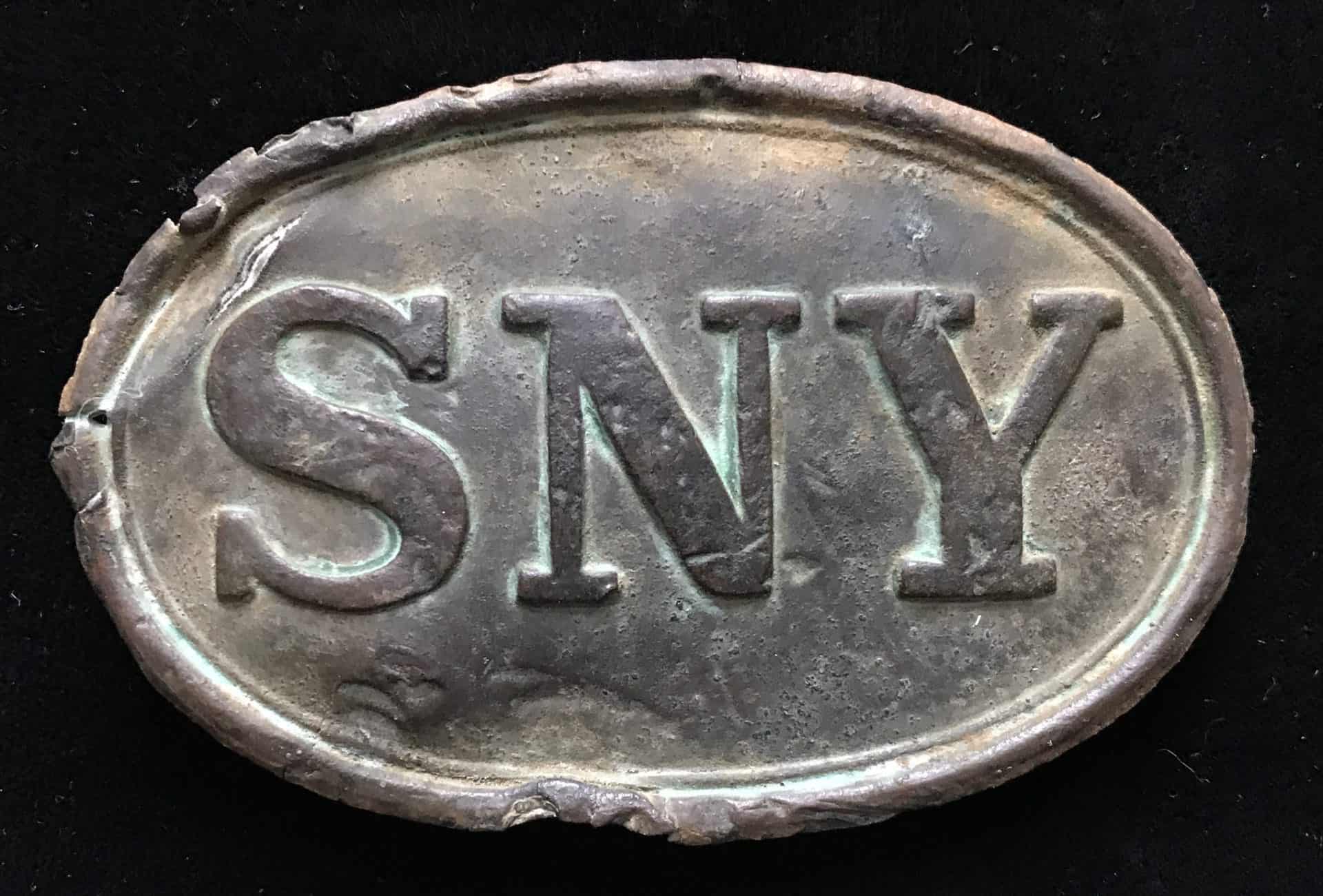 sny belt buckle