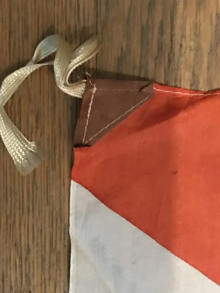 WWII Japanese Rising Sun flag, showing corner stitching and texture