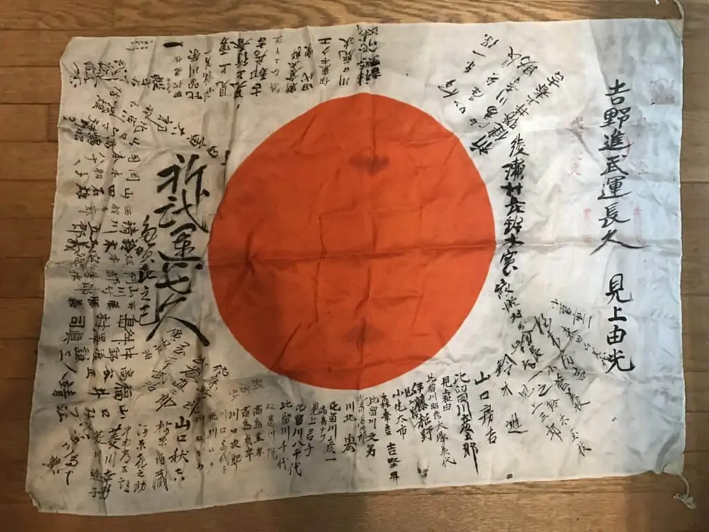 Original WWII Japanese soldier’s personal national flag with kanji inscriptions, brought home by a U.S. veteran