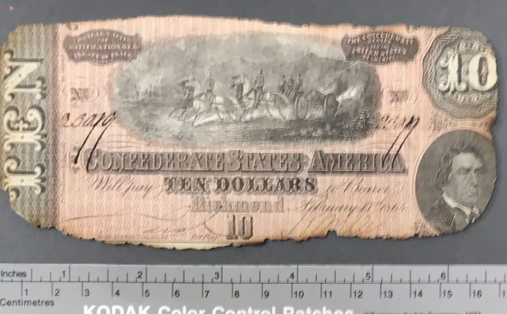 Close-up of burned Confederate $10 note from Georgia, authenticated by Gettysburg Museum of History