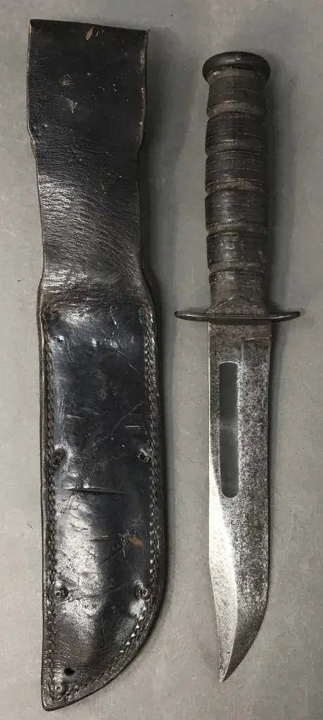 Side view of original WWII Navy Mark 2 Fighting Knife and sheath