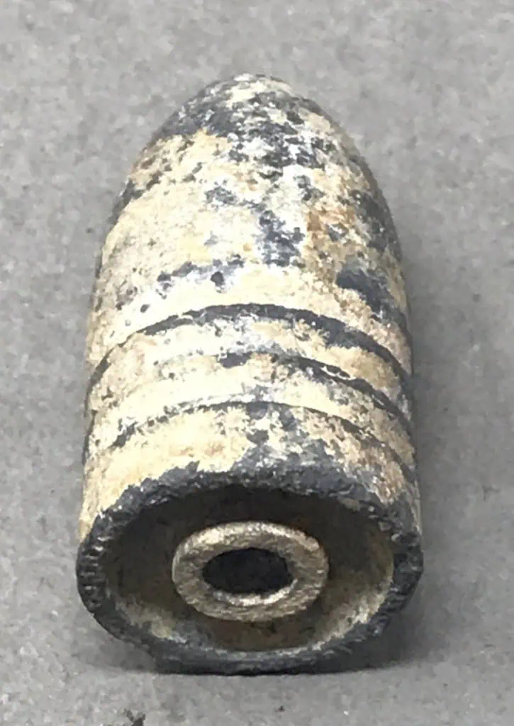 Side view of two Civil War explosive bullets recovered at Chancellorsville