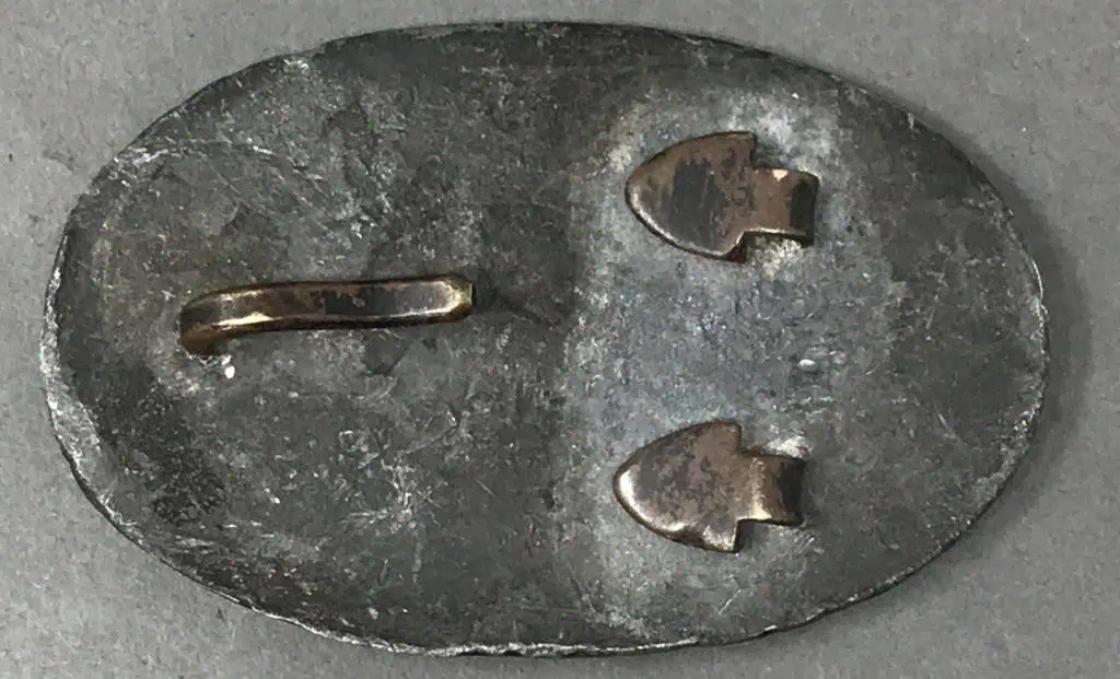 Back view of Civil War U.S. belt plate buckle with original fasteners