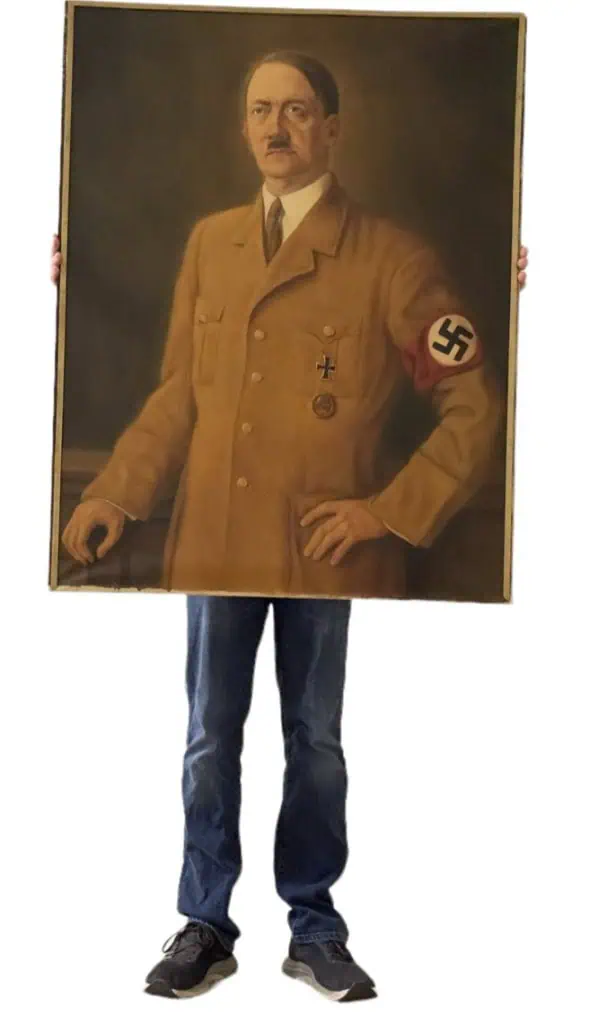 Detailed view of Adolf Hitler's uniform insignia in life-size painting by Conrad Hommel