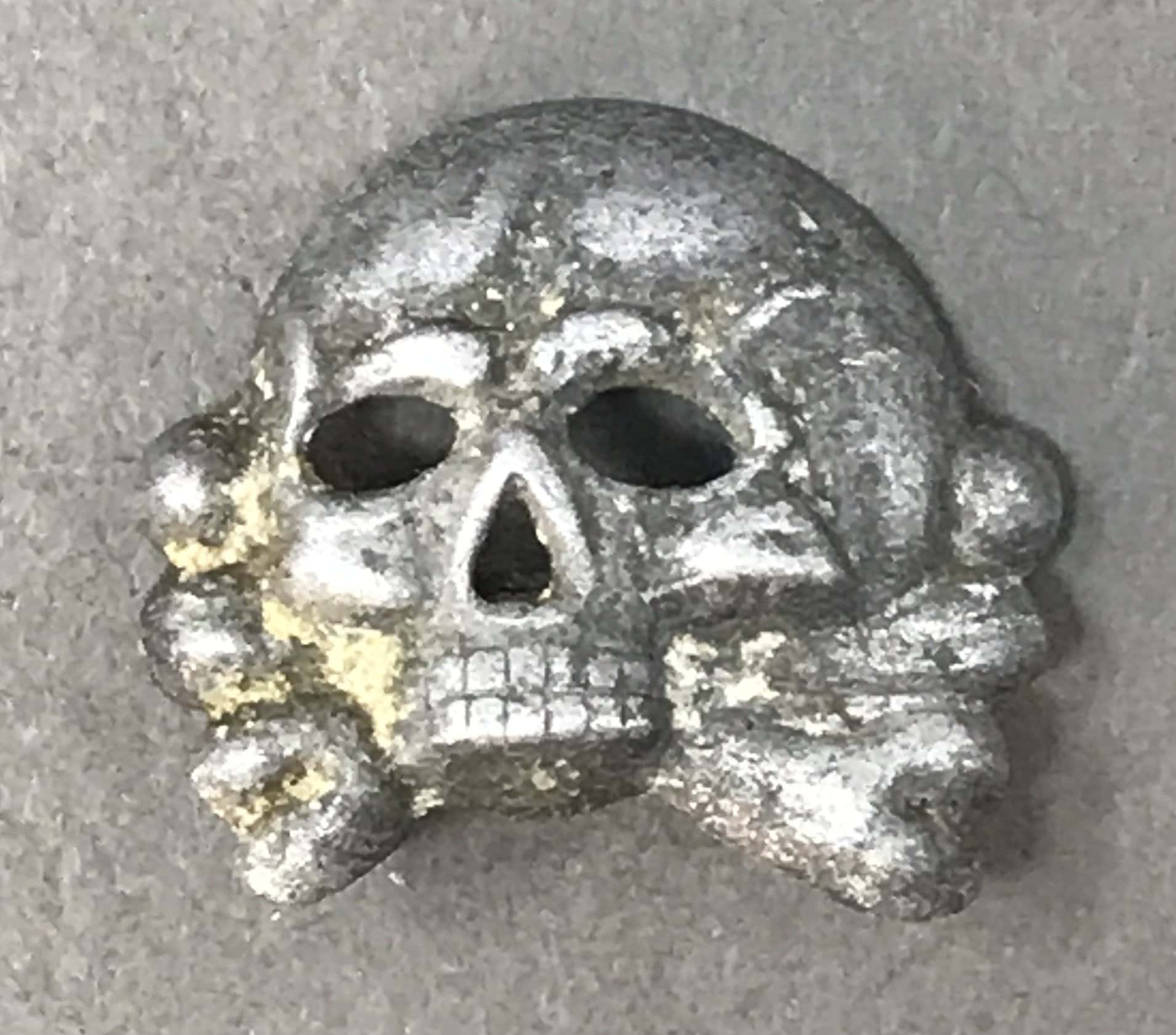 XX store cap skull pin from WW2 & WWII